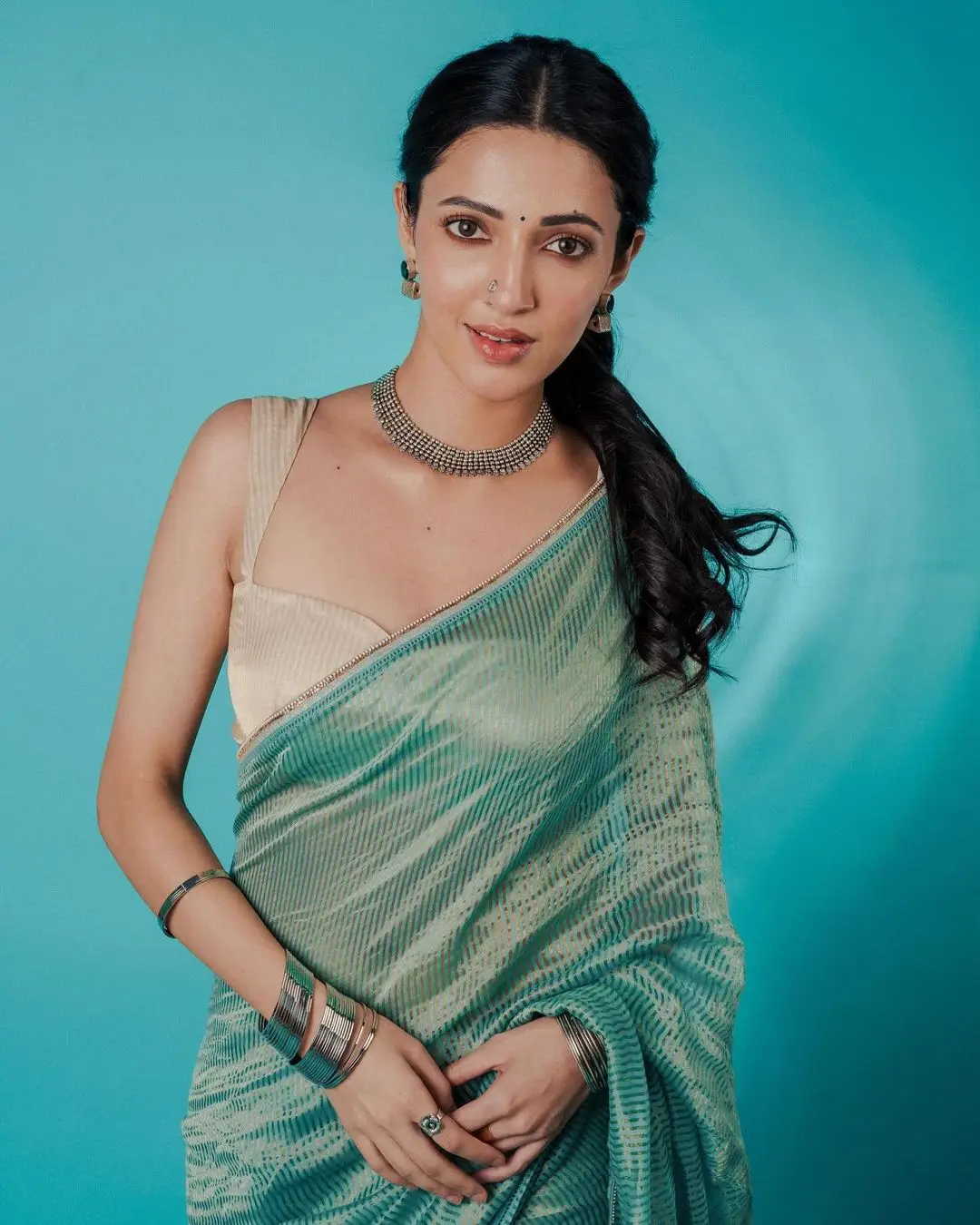 Neha Shetty Wearing Beautiful Earrings Jewellery Blue Saree